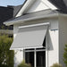 Luxi Living Solaris Motorised Retractable Drop-Arm Window Awning -   Light Grey Awning with white frame.