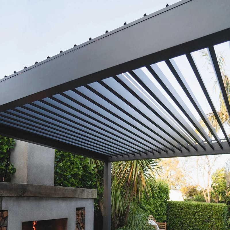 Luxi Living Tasman Motorised Freestanding Louvre Roof Aluminium Pergola - charcoal pergola opened