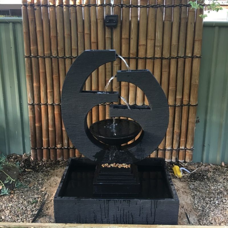New Eclipse Fountain placed in the backyard with Bamboo background