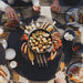 OFYR-Tabl-O-Placemat-Black on Table with food