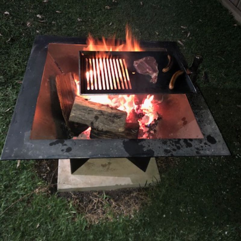 Pinnacle  Firepit alight with hotplate