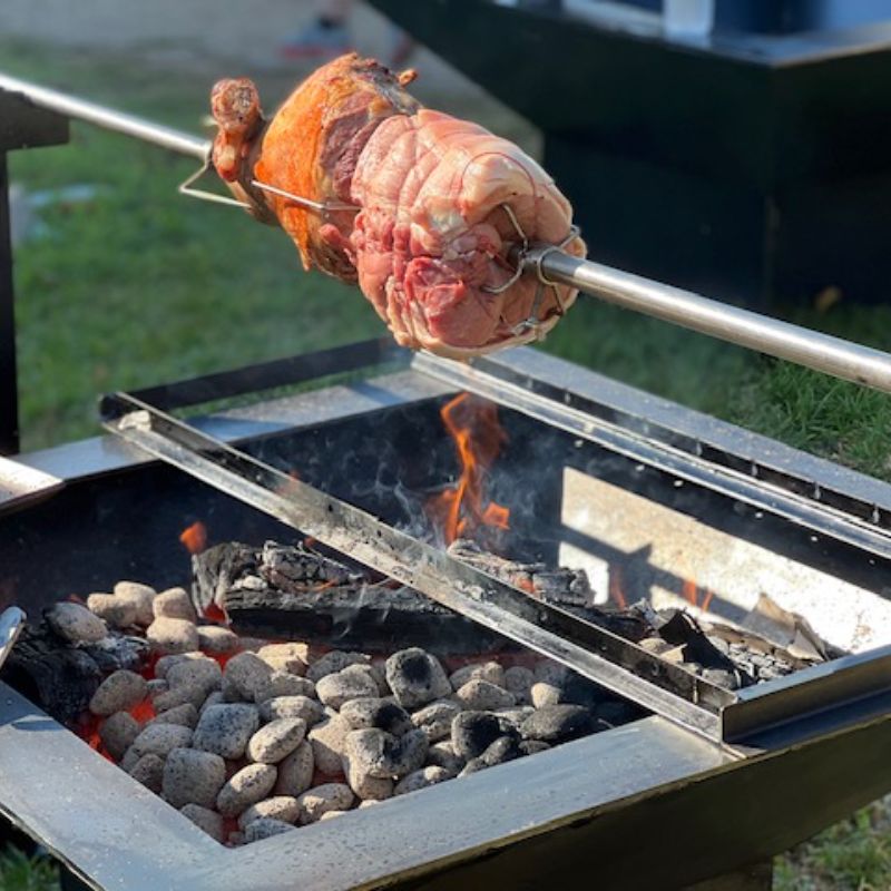 Pinnacle Fire Pit with spitroast over coals