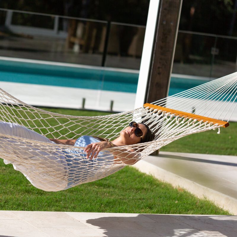 Resort King Polyester Rope Hammock Cream outdoor with woman by the pool
