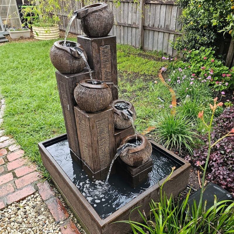 Streaming Pots Fountain at the garden