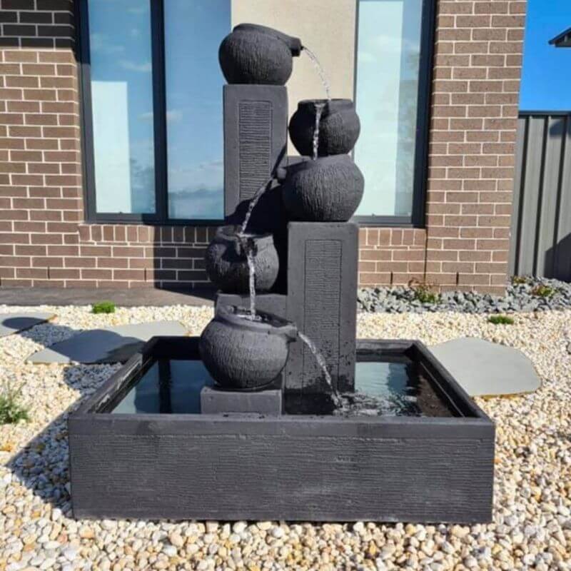 Streaming Pots Fountain with pebbles