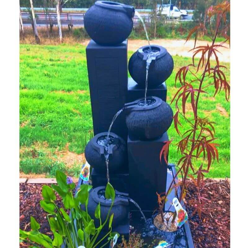 Streaming Pots Fountain with plants