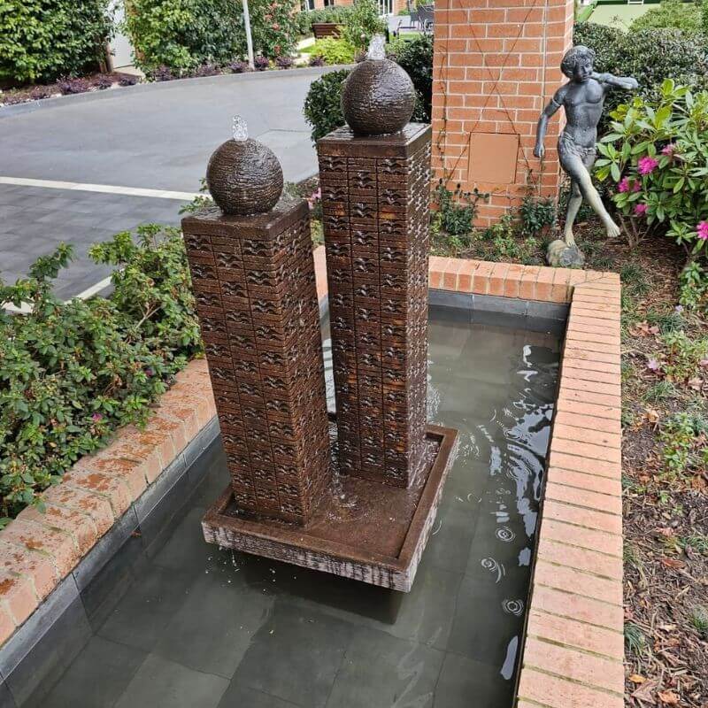 Twin Column Fountain rust in pond