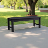 Winawood Backless Bench Seat- charcoal grey in the garden