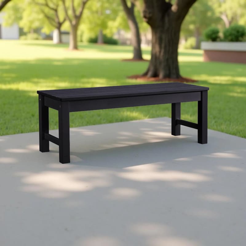 Winawood Backless Bench Seat- charcoal grey in the garden