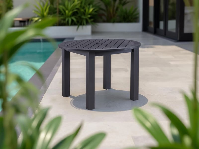 Winawood Round Dining Table-charcoal grey table poolside