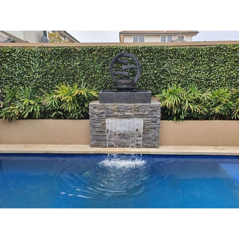 Wagon Wheel Fountain Medium Charcoal besides the pool