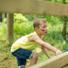 Wooden Climbing Cube with slide kid on the slid