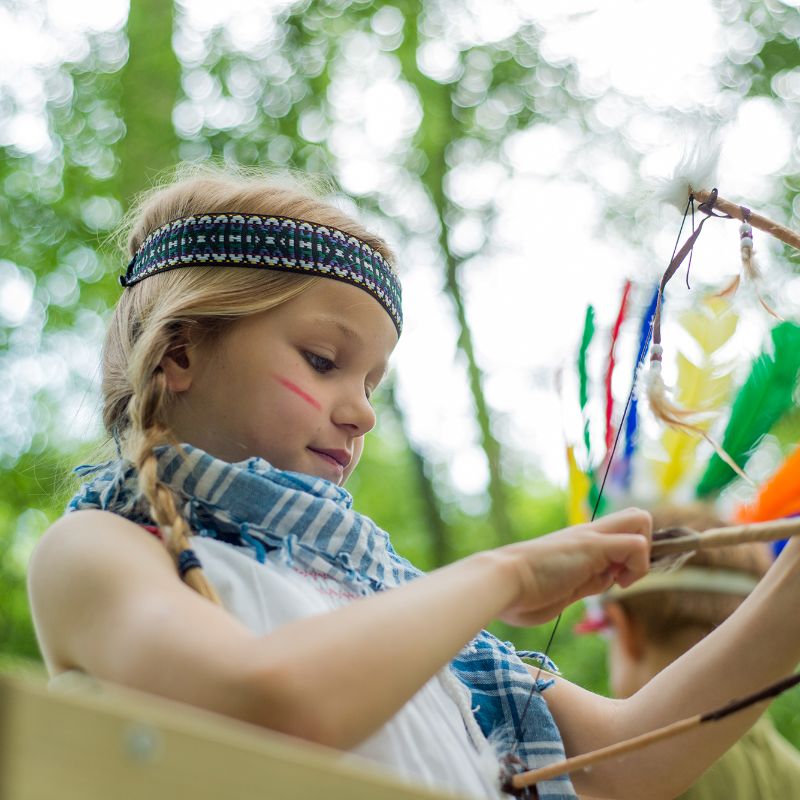 Wooden Climbing Cube with slide  Girl playing with a bow and arrow