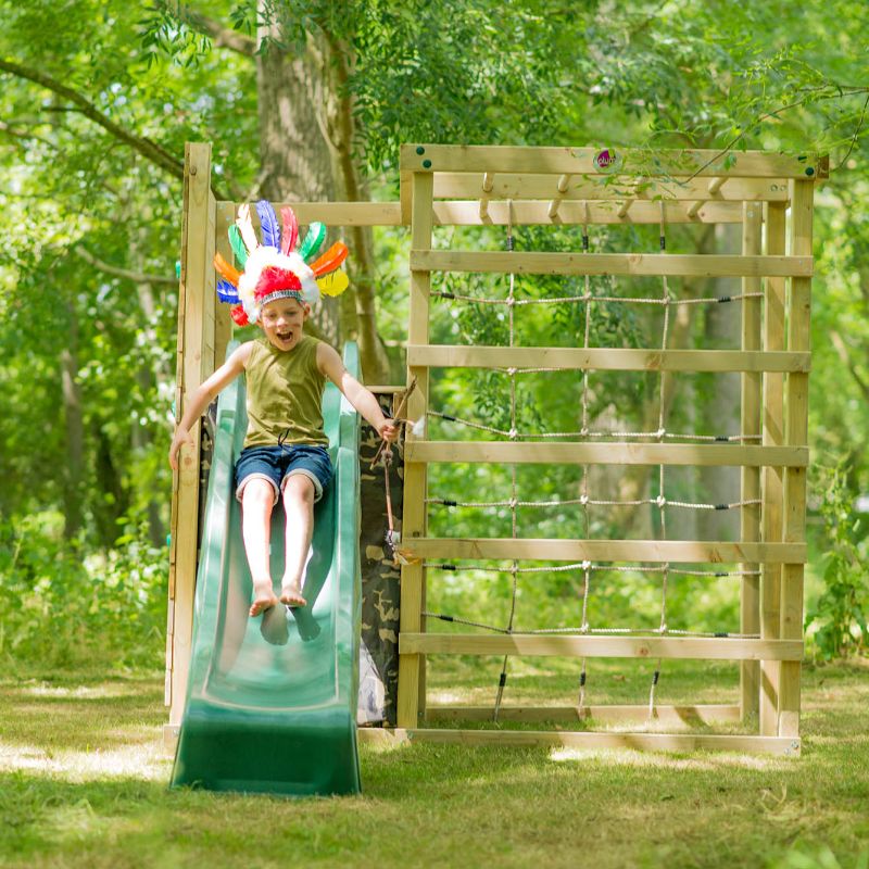 Wooden climbing cube play area boy on the slide