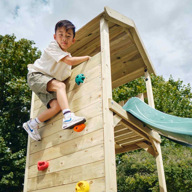 Wooden lookout Tower Climbing Rocks wall Boy Climbing