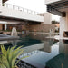 Ecosmart Fire stix stainless steel beside the pool