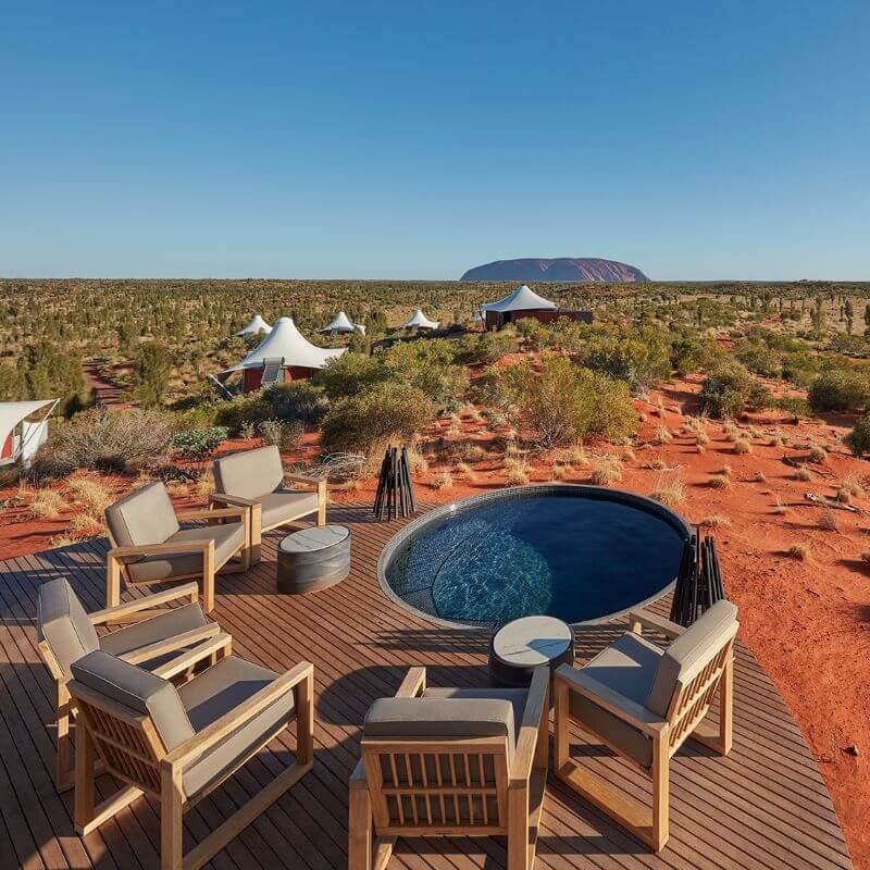 Ecosmart Fire stix by the round pool and desert background
